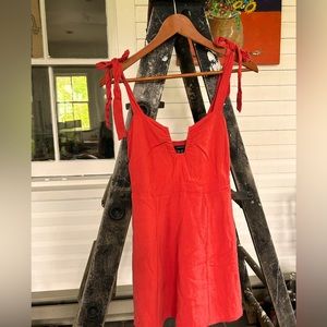 Coral mini dress with adjustable tie straps